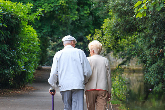 Older couple walking together